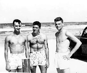 Members of NAS Jacksonville’s baseball team, LTjgs Duncan and Barksdale and Midshipman Whitten at JAX beach.