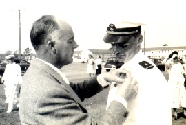 Whitten's father pinning on his WINGS OF GOLD   with Mickey and my mother in background.