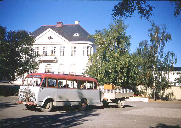 Levanger, Norway. Twice daily bus from Skogn carries milk cans and gives Taft and Wilbur a ride.  